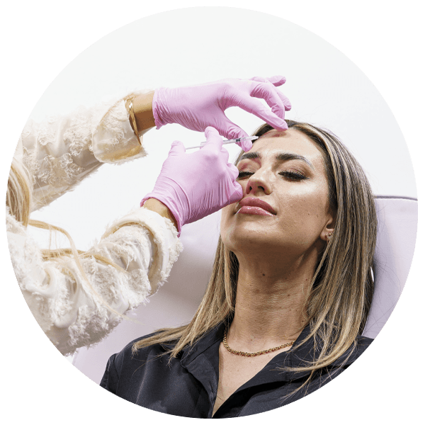 botox being injected pink gloves